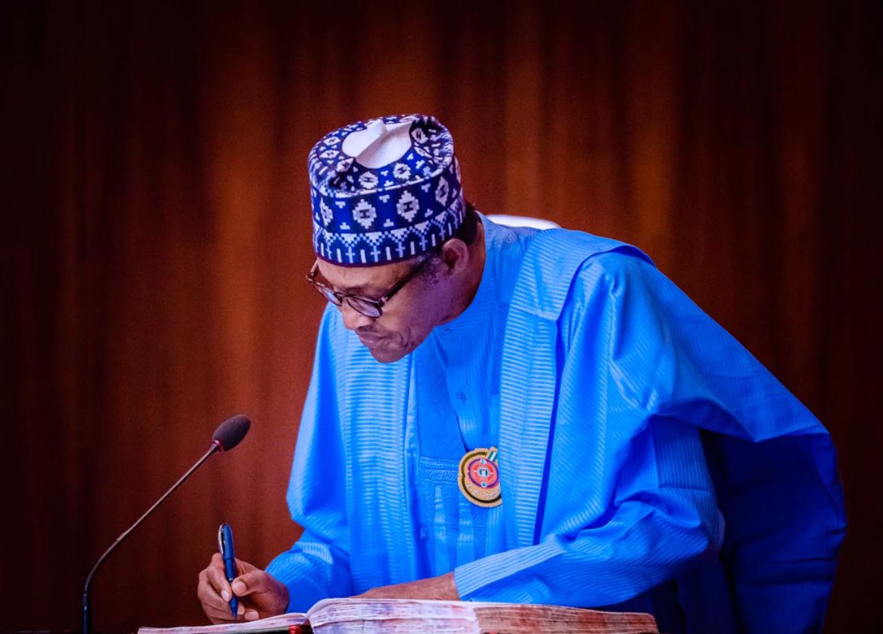Buhari Swears In Two New INEC Commissioners